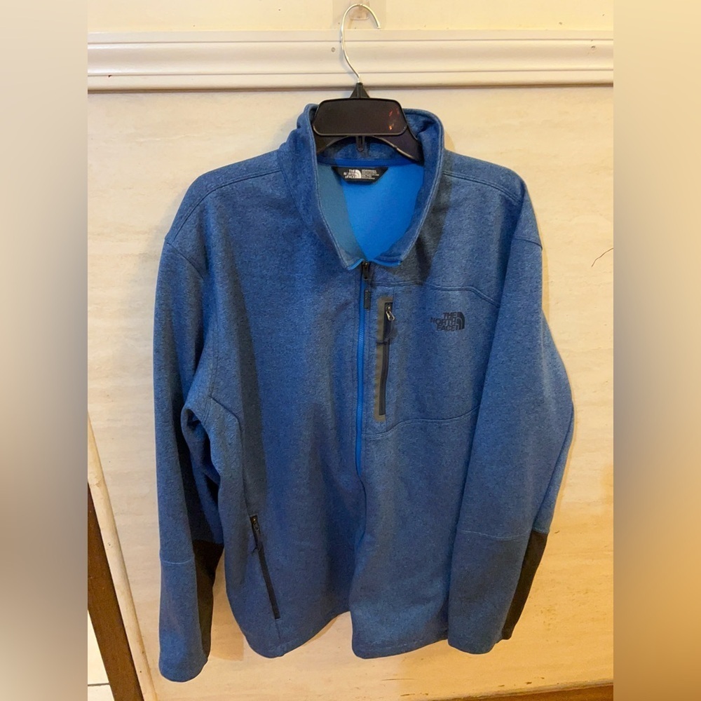 The North Face Men's Canyonlands Full-Zip fleece jacket in a blue heather color.